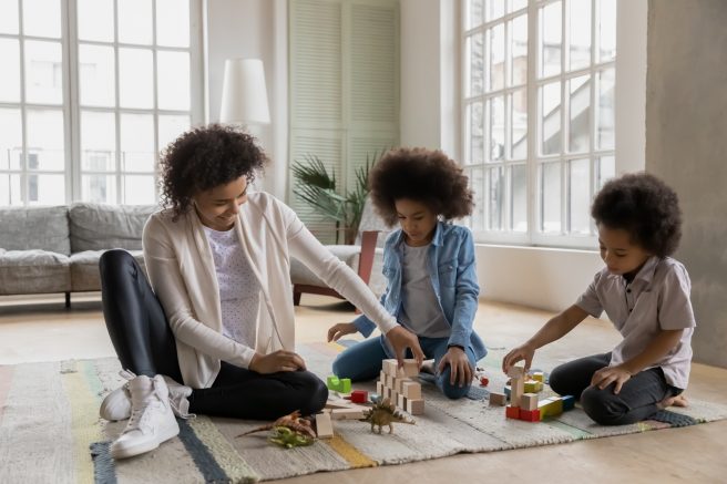 Extended time at home is an excellent opportunity for families to connect and play. © fizkes / iStock via Getty Images Plus