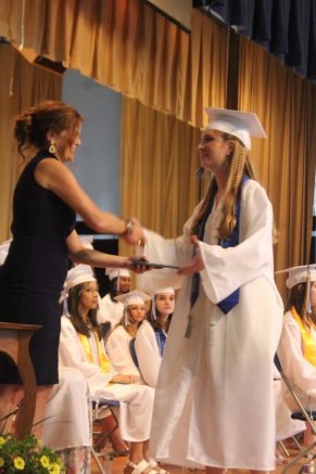 Natalie Radwan of West Seneca receives her diploma from Head of School Michele Melligan.