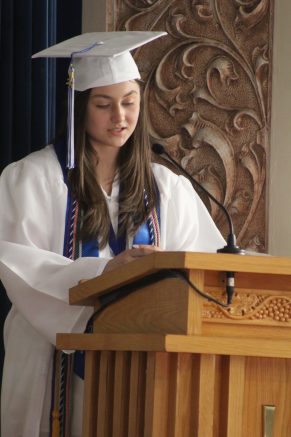 Salutatorian Jillian Schneck welcomes everyone to the 118th commencement.